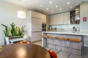 Modern kitchen with island and bar stools